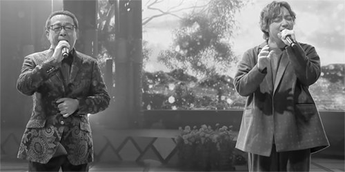 風に立つライオン